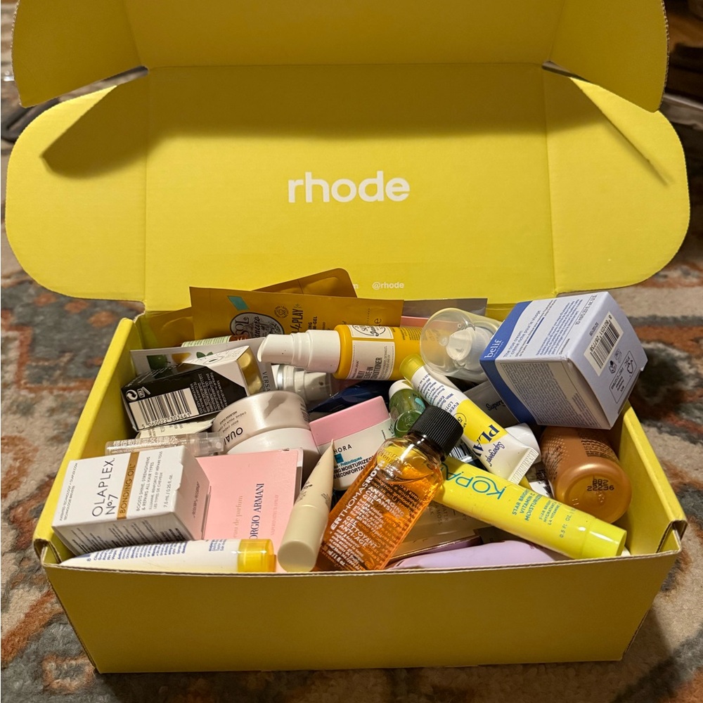 Box of deluxe beauty and fragrance samples